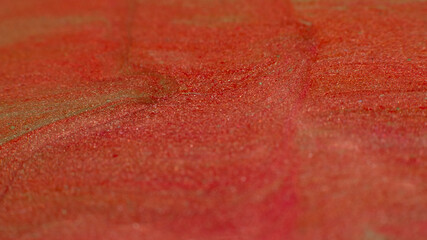 Mixed paints art. Abstract design background. Red glitter blend