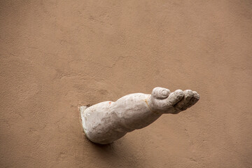 Stone arm in a wall