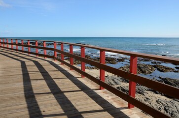 Wooden path along the sea in Mijas, Málaga, Spain - 528539227