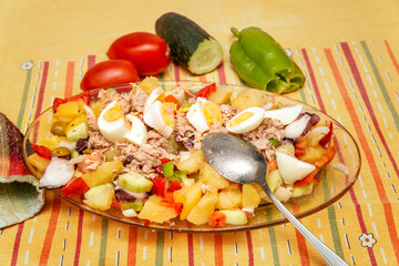 mixed potato salad with tuna and ingredients