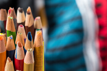 Close up of some broken colored pencils 