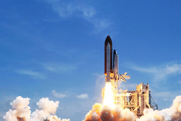 Launch of a space shuttle into space. Elements of this image furnished by NASA