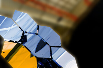 Mirror of a modern space telescope. Elements of this image furnished by NASA