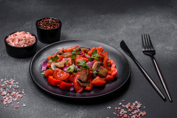 A salad of baked mushrooms, tomatoes, onions, parsley, spices and herbs