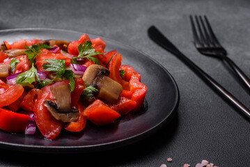 A salad of baked mushrooms, tomatoes, onions, parsley, spices and herbs