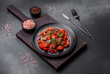 A salad of baked mushrooms, tomatoes, onions, parsley, spices and herbs