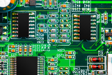 Close up of components and microchips on PC circuit board.