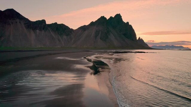 Vestrahorn mountain on black sand beach in the morning at Stokksnes Peninsula, Iceland