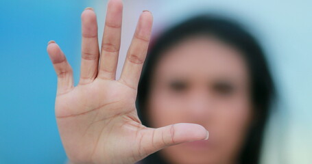 Black African woman expressing NO with her hand