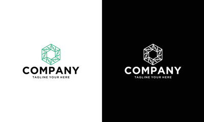 Abstract hexagon geometric technology logo design with dot and circuit symbol on a black and white background.
