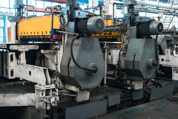 Industrial machines in metalworking factory, production industry.