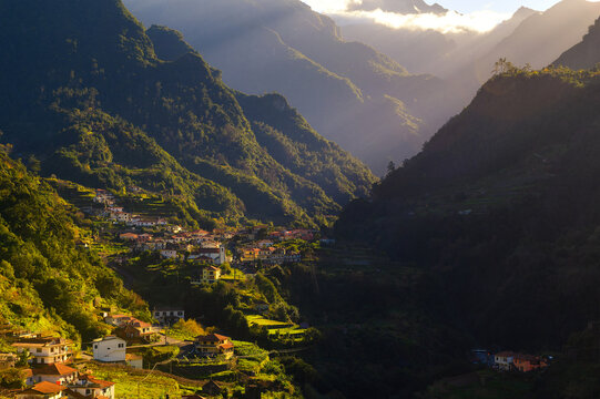 Sunset above villages in the mountains of Madeira Islands, Portugal