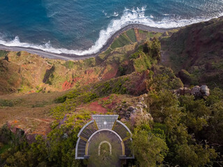 Aerial view of the glass skywalk above the Cabo Girao cliff. Sightseeing point near the capital of Funchal, Madeira, Portugal. - 528558036