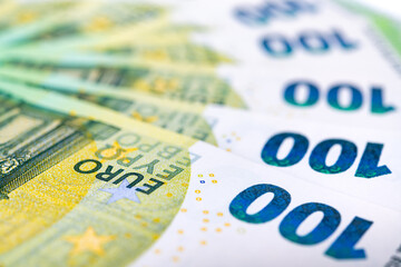 Detail of the word Euro on the one hundred euro banknote. European currency close-up photograph.