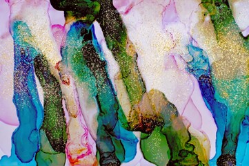 Columns of ink filled with golden dust on Alcohol ink fluid abstract texture fluid art with gold glitter and liquid.