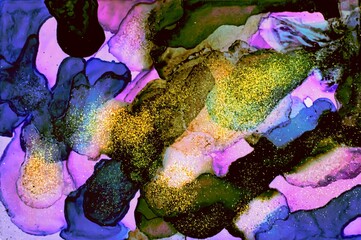 Yellow golden dust on blue and green Alcohol ink fluid abstract texture fluid art with gold glitter and liquid.
