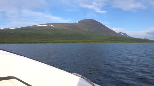 Sailing on lake with view of mountain and snow

Boat sail in lake, sweden, 2022
