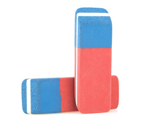 Two erasers isolated on a white background, close up.