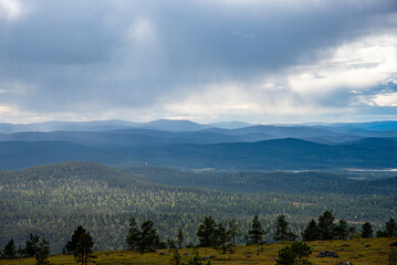 Misty mountains and forest in Lapland Finland