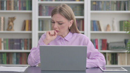 Fototapeta na wymiar Sick Woman Coughing Working on Laptop