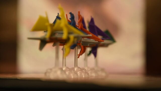 Board game ships rotating on macro video tabletop gaming footage