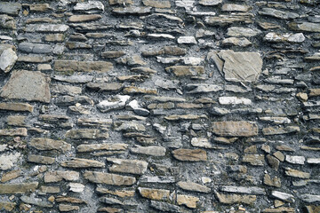 Bricks of ancient paving stones on the pavement          