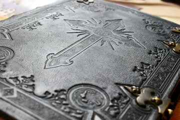 Holy Bible, Leather book cover with cross symbol on a bible