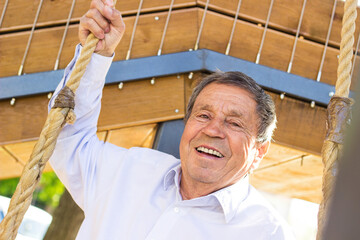 Portrait of active senior man smiling