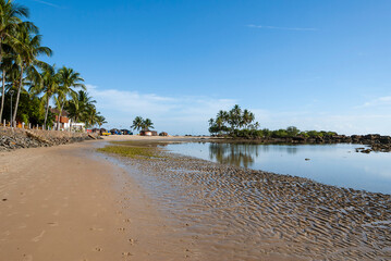 Morro de São Paulo, Bahia, Brazil. The second beach. Early in the morning in the village. Low tide and blue sky.