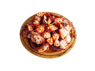 Pulpo a la gallega in Spanish meaning Galician-style octopus or polbo a feira meaning fair-style...