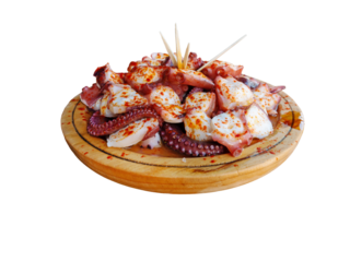 Pulpo a la gallega in Spanish meaning Galician-style octopus  or polbo a feira meaning fair-style octopus in gallego a traditional Galician dish. Isolated transparent png. 