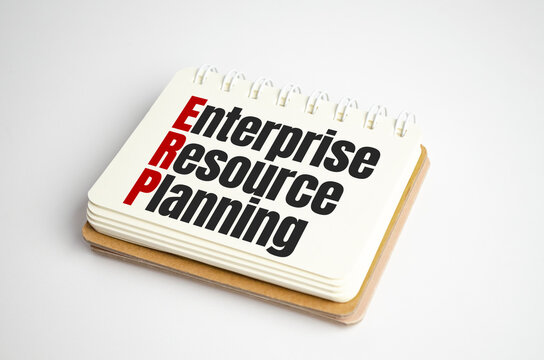 erp - enterprise resource planning words on notebook