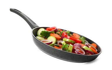 Mix of vegetables in frying pan isolated on white