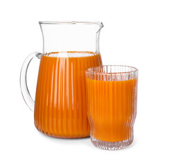 Fresh carrot juice in jug and glass isolated on white