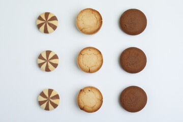 Fototapeta na wymiar Sweet delicious homemade cookies on white background, top view