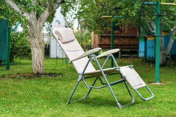 Light lounge chair for relaxation in the garden