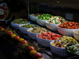 Fototapeta na wymiar fresh and delicious salads at the hotel buffet