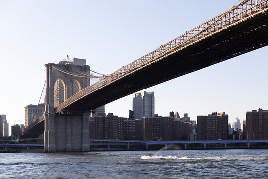 Jet skis under the Brooklyn Bridge