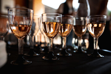 Rose wine glasses for a tasting with friends. Close up view