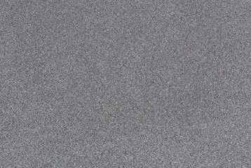 Fototapeta premium Background - black sandpaper with a rough structure.