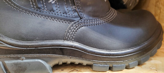 protective work boots made of plastic rubber and leather