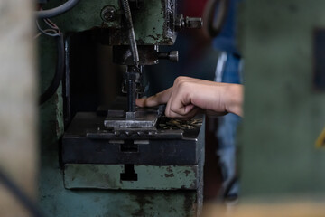 Machine and tool of Computer numerical control CNC, factory creates metal religion art such as Gold rolling machine and little jewelry in religious ceremony.