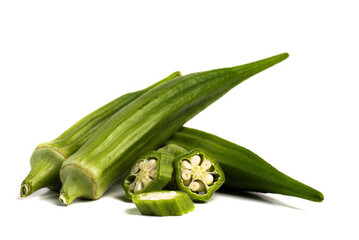 Green fresh okra. Whole pods and pieces on white background.