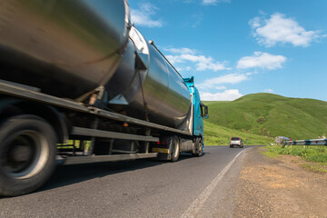 blue truck in asphalt road