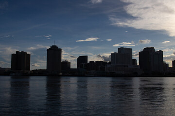City scene of downtown New Orleans Louisiana seen from ferry boat while out on the Mississippi...