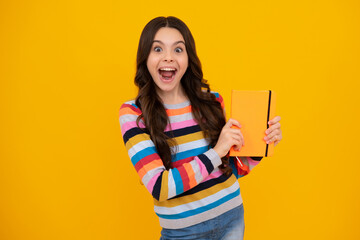 Amazed teenager. Teenager school girl with books isolated studio background. Excited teen girl.