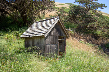 Wooden old time building at Scorpion Ranch on Santa Cruz Island in the Channel Islands National Park near Santa Barbara California United States - obrazy, fototapety, plakaty