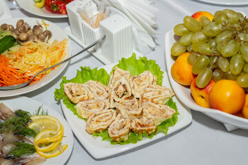 Table setting in the restaurant, dishes on the table