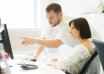 Obraz premium a team of employees, different employees work together in a conference room, in the office they brainstorm, discuss, analyze and plan a business strategy