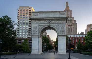 Fototapeta na wymiar The Washington Square Arch During Sunrise with 5th ave and the Empire State Buidling in the background